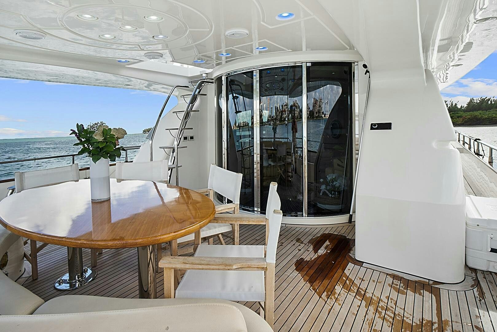 a table and chairs on a boat aboard SUN ADVENTURES Yacht for Sale