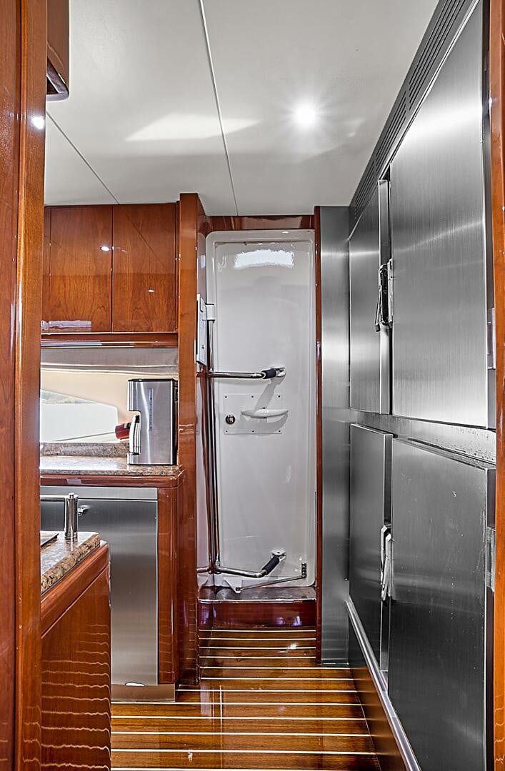 a large kitchen with stainless steel appliances aboard SUN ADVENTURES Yacht for Sale