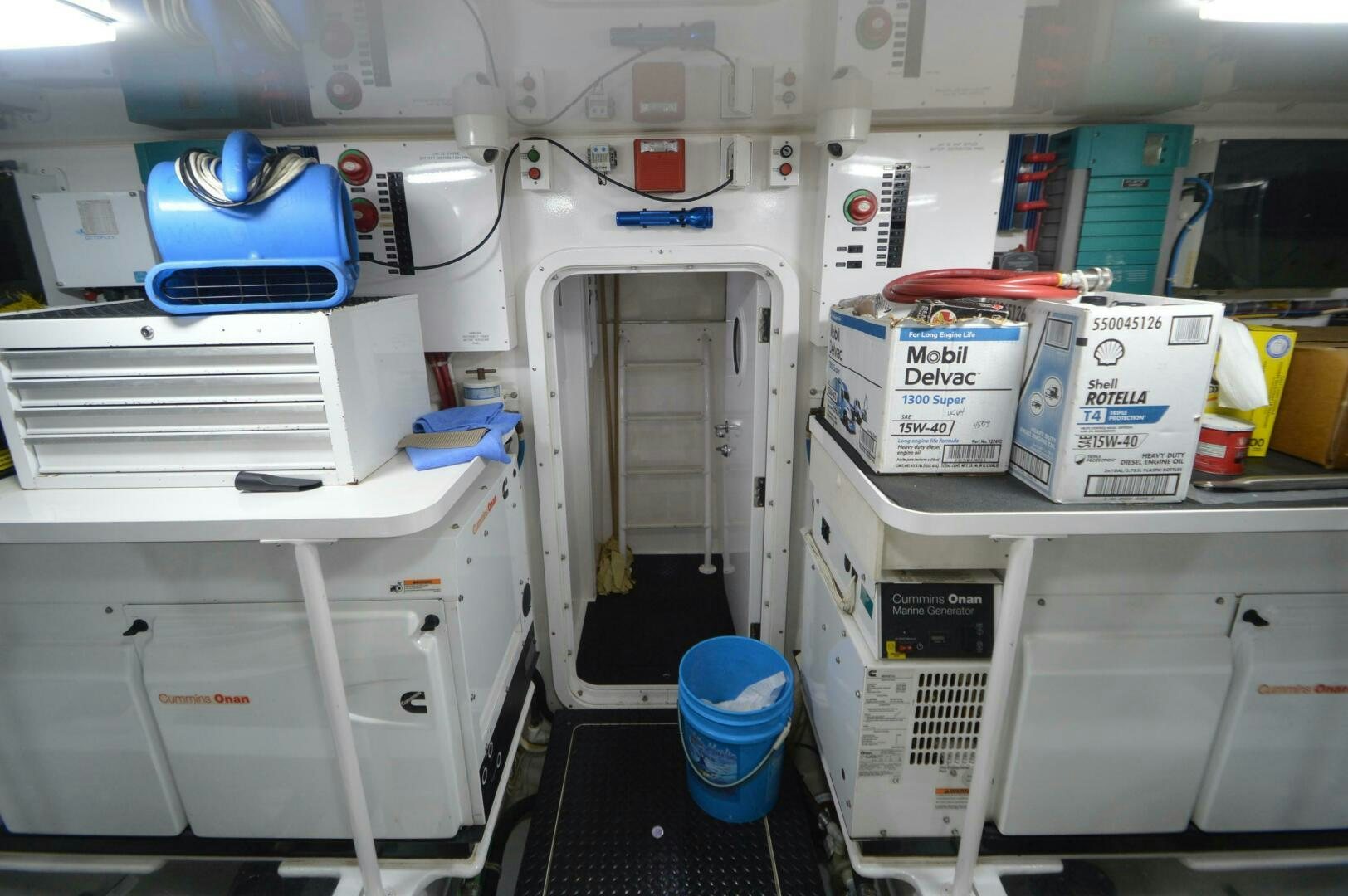 a room with white cabinets and white cabinets aboard LOW PROFILE Yacht for Sale