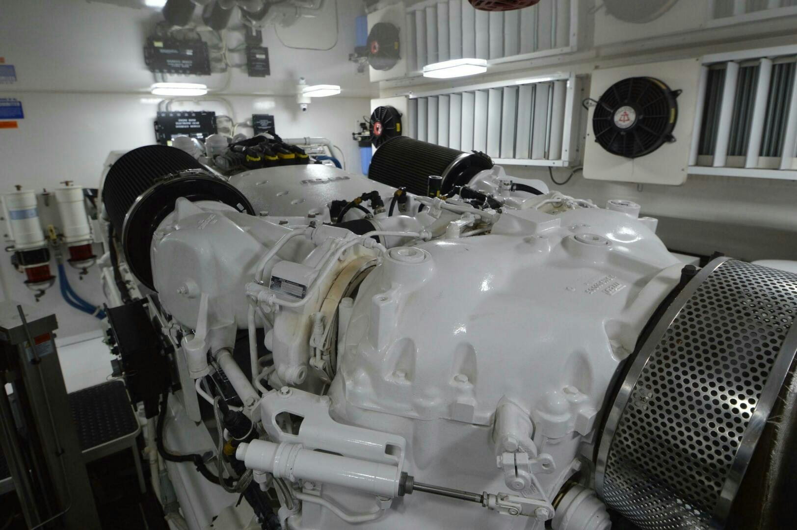 a group of people working in a factory aboard LOW PROFILE Yacht for Sale