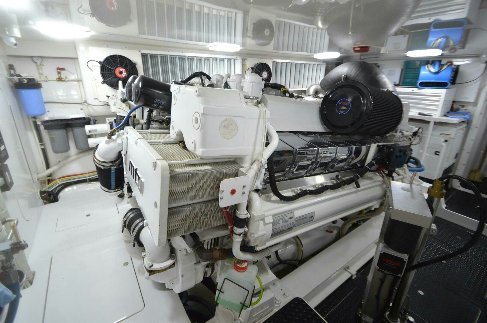 a machine with a large black helmet aboard LOW PROFILE Yacht for Sale