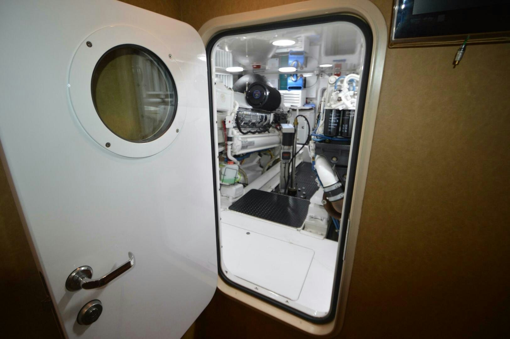 a white washing machine aboard LOW PROFILE Yacht for Sale