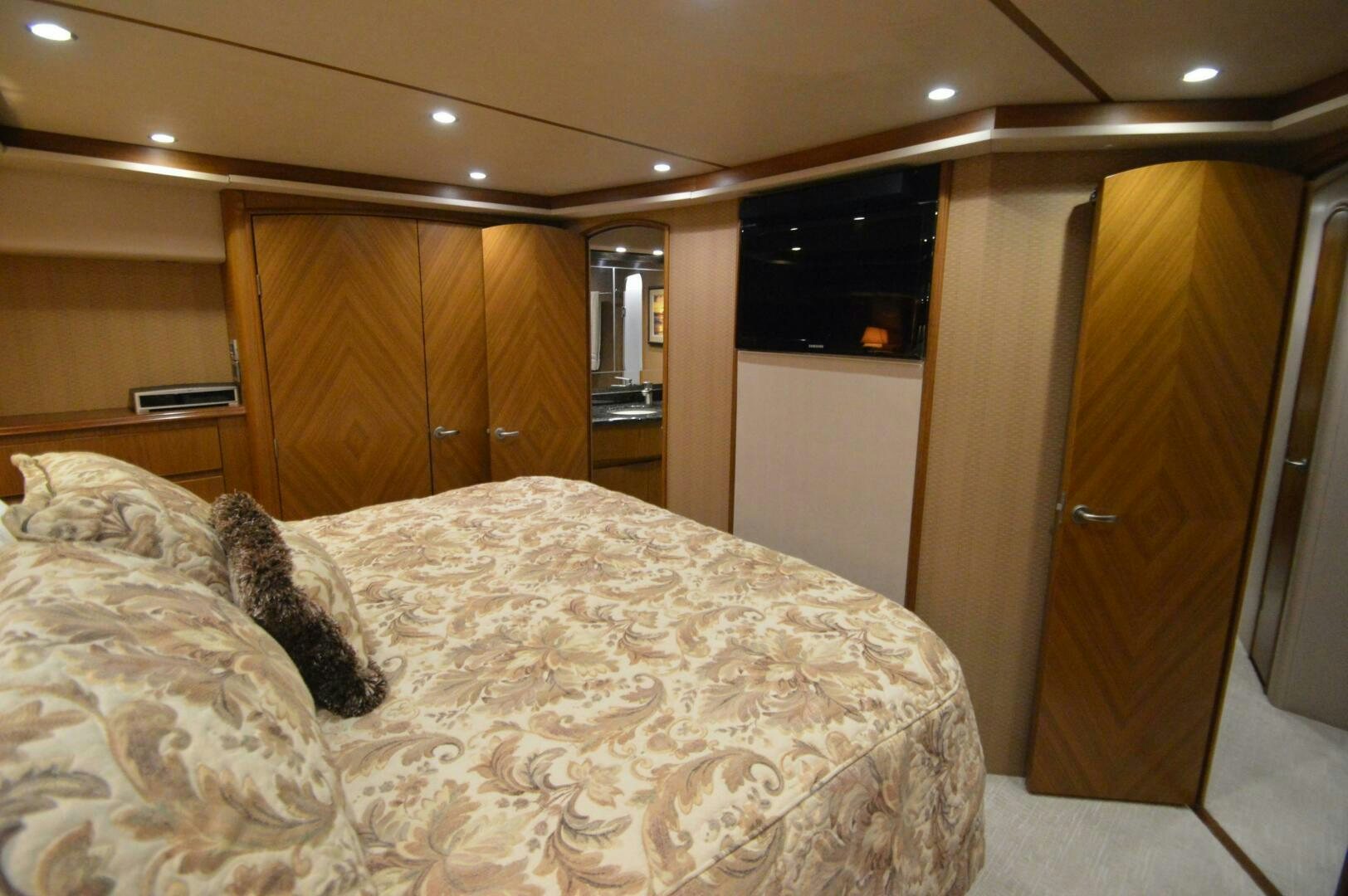 a bed in a room aboard LOW PROFILE Yacht for Sale