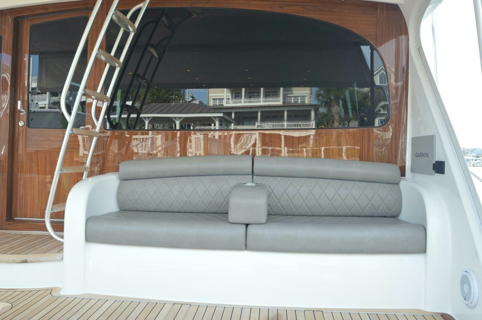 a couch with a lamp on it aboard LOW PROFILE Yacht for Sale