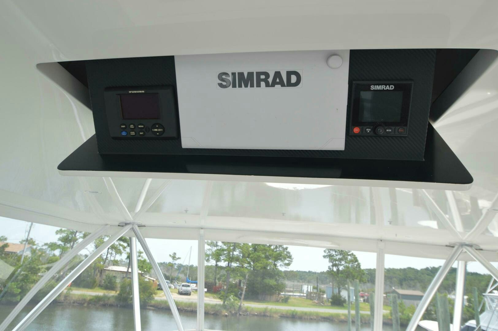 a close-up of a car stereo aboard LOW PROFILE Yacht for Sale