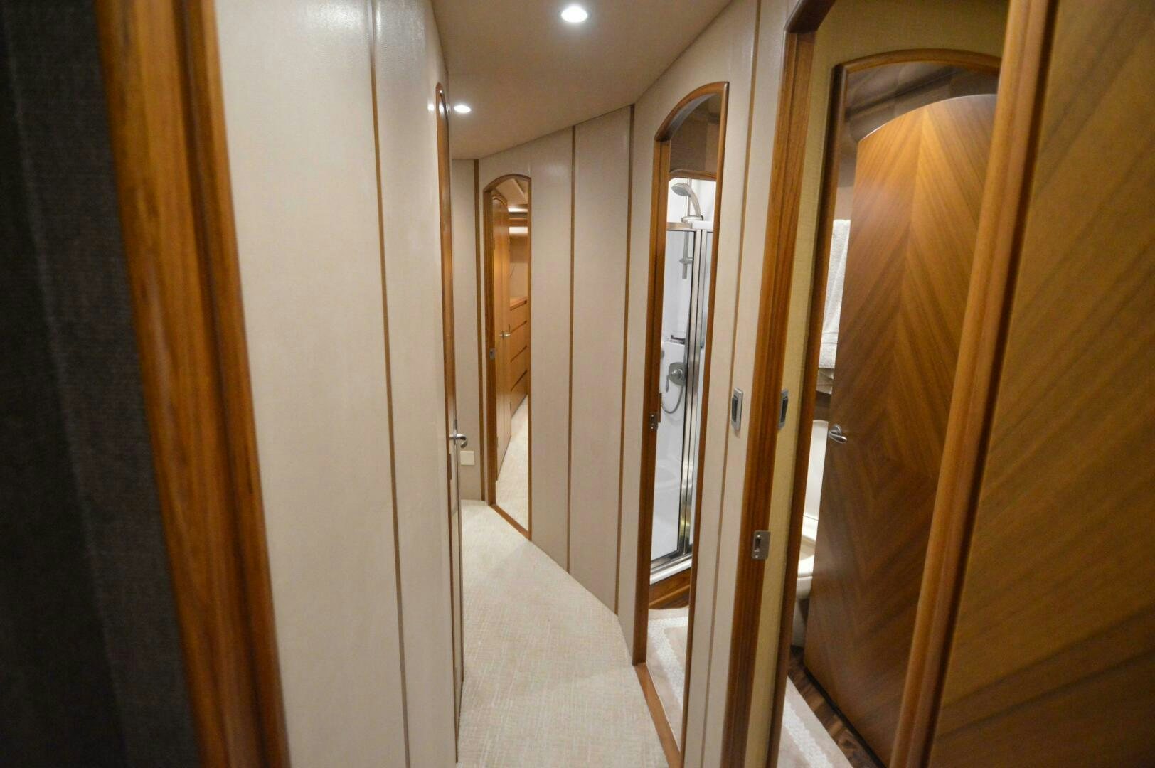 a hallway with doors aboard LOW PROFILE Yacht for Sale