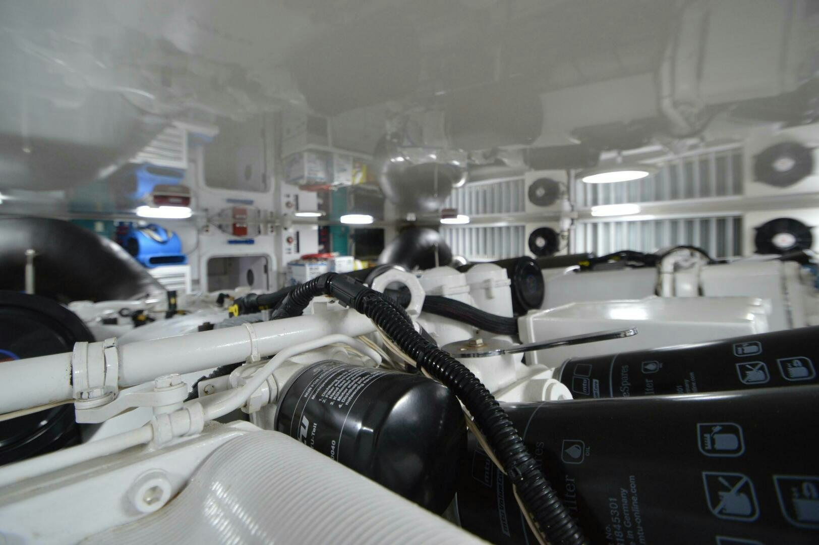 a machine in a room aboard LOW PROFILE Yacht for Sale