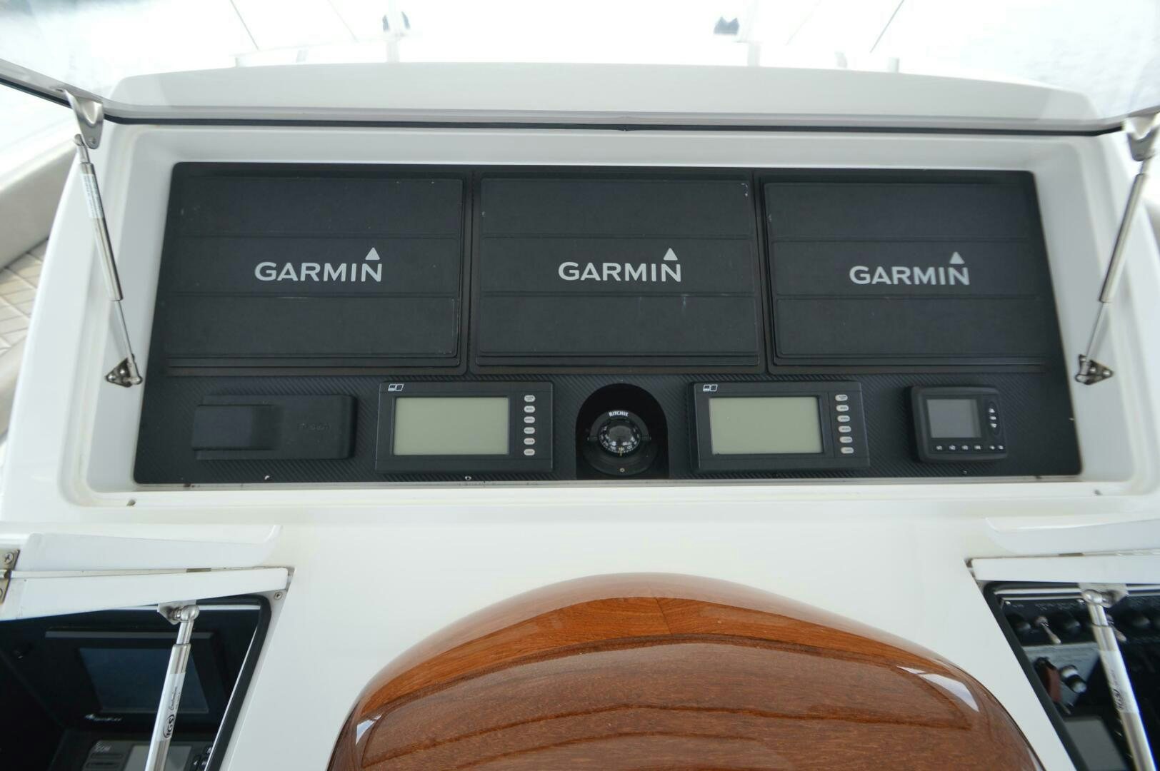a black and silver electronic device aboard LOW PROFILE Yacht for Sale