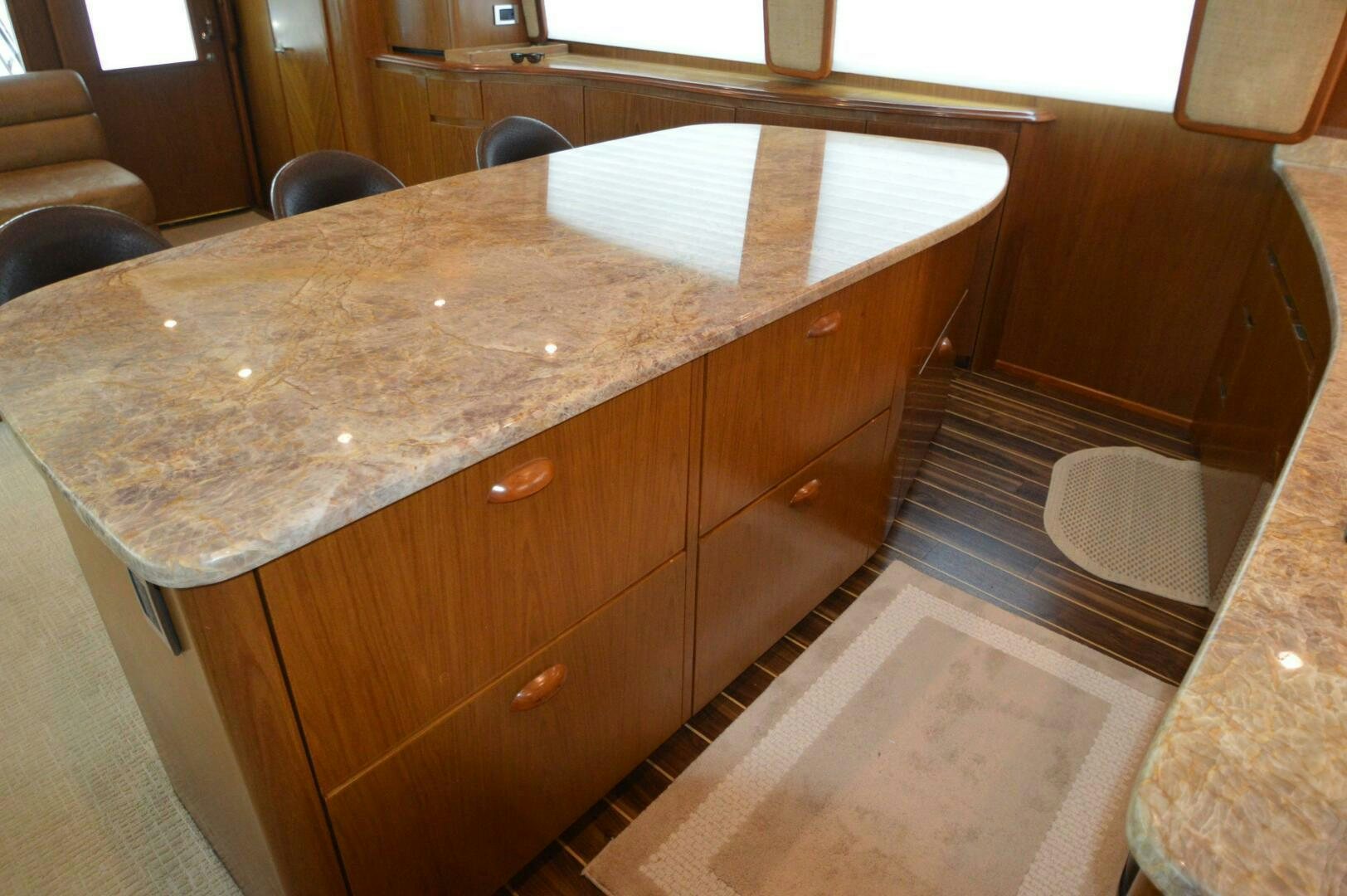 a kitchen counter with a table aboard LOW PROFILE Yacht for Sale