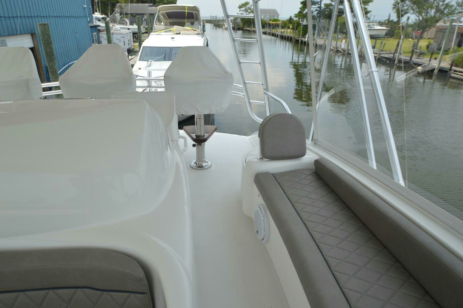 a glass of wine on a boat aboard LOW PROFILE Yacht for Sale