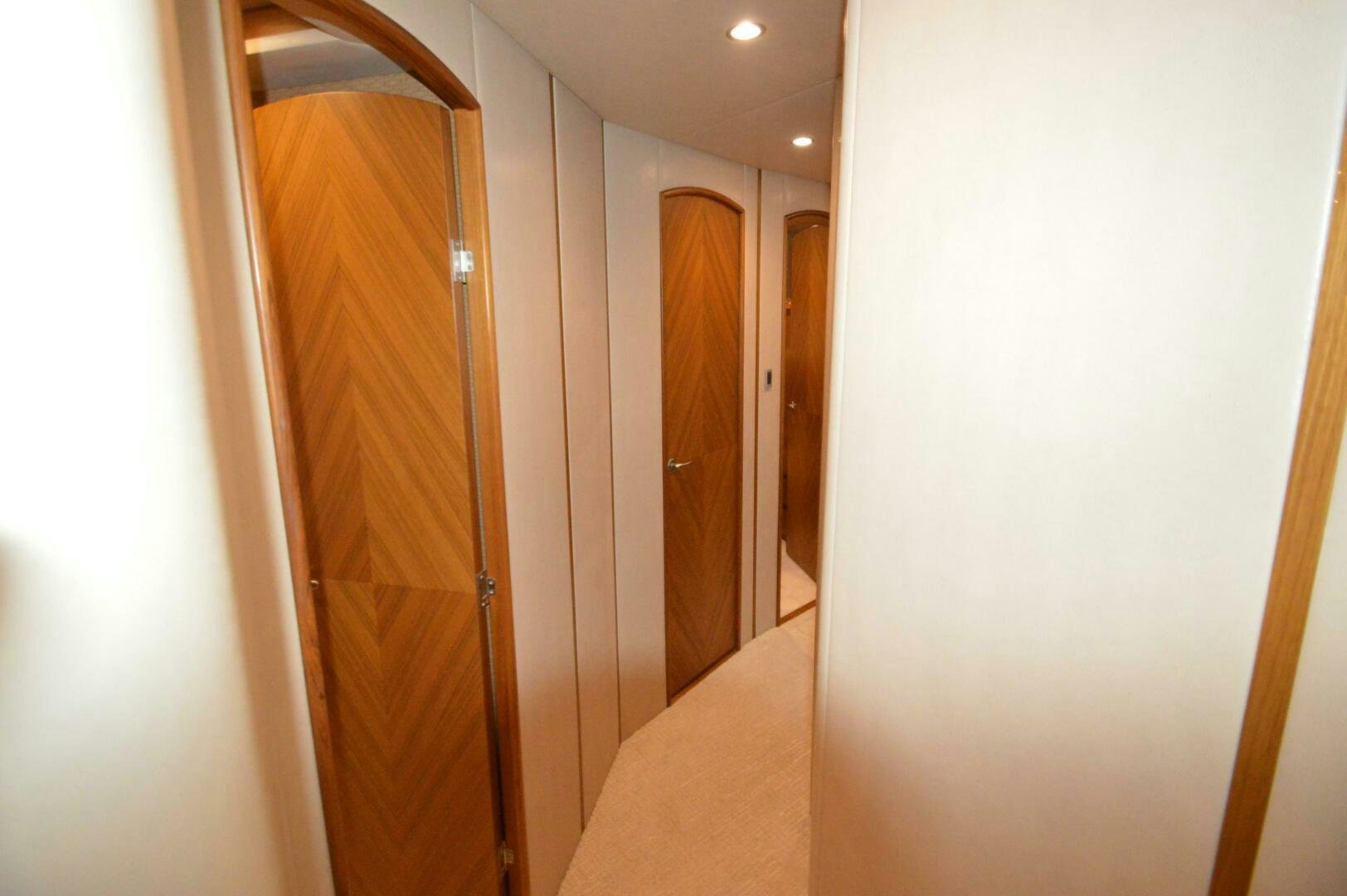 a hallway with doors aboard LOW PROFILE Yacht for Sale
