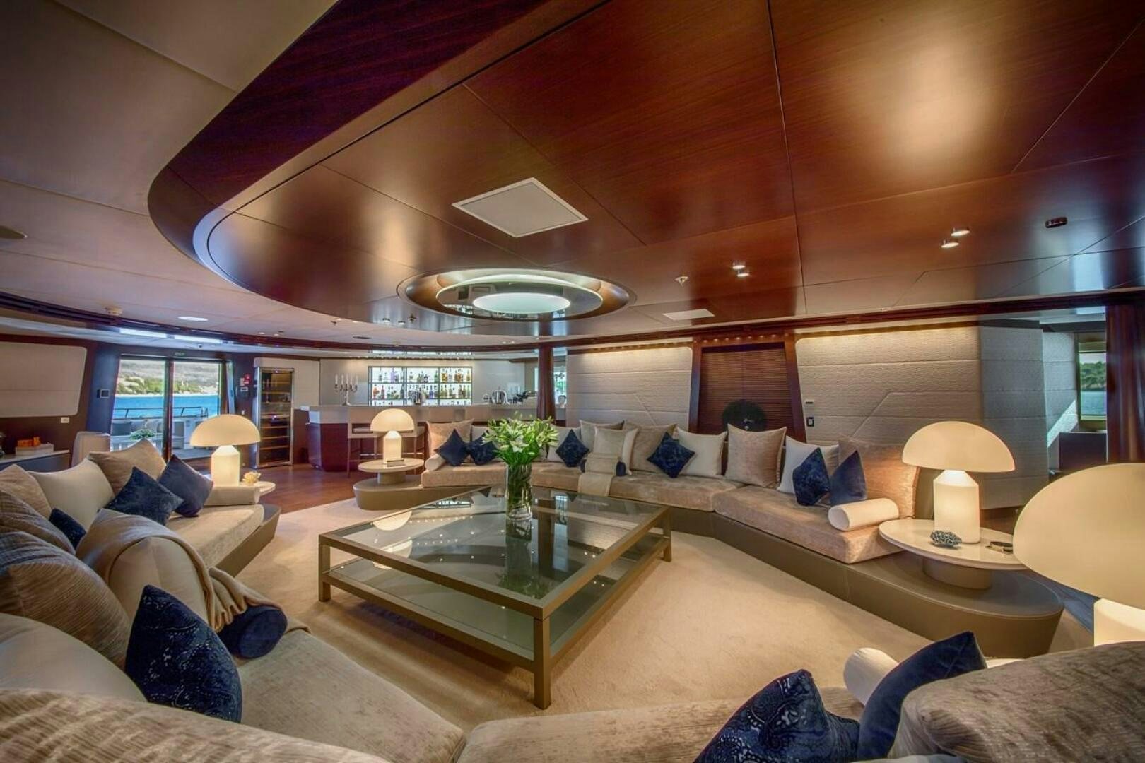 a living room with a large open ceiling aboard KATINA Yacht for Sale