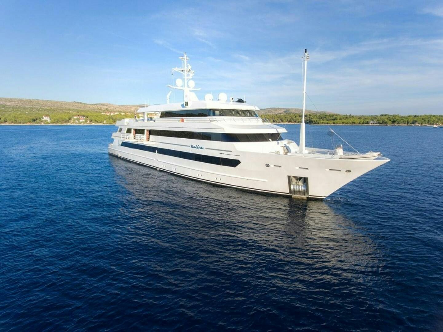 a white boat in the water aboard KATINA Yacht for Sale