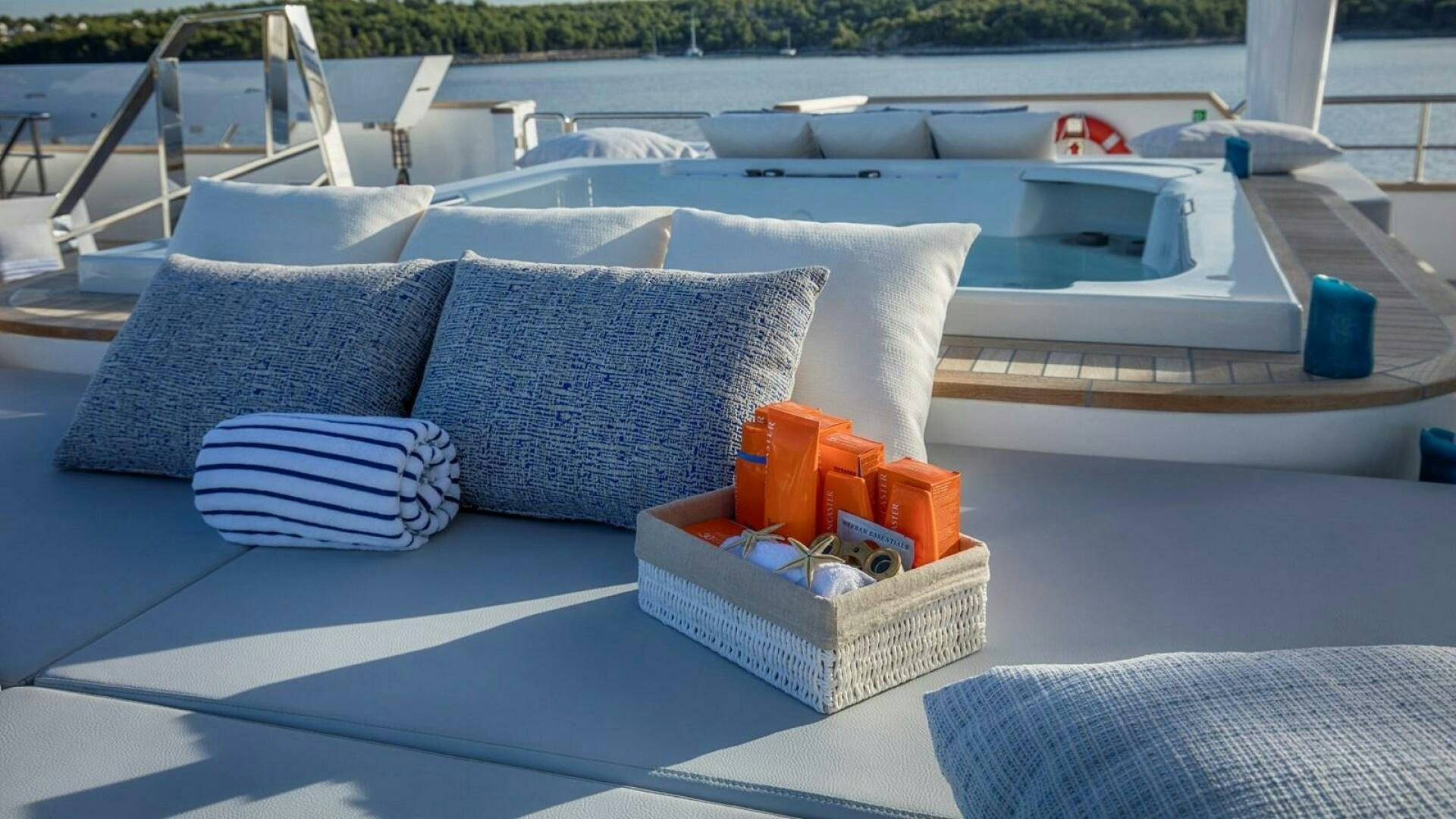 a pool table with pillows and cushions aboard KATINA Yacht for Sale
