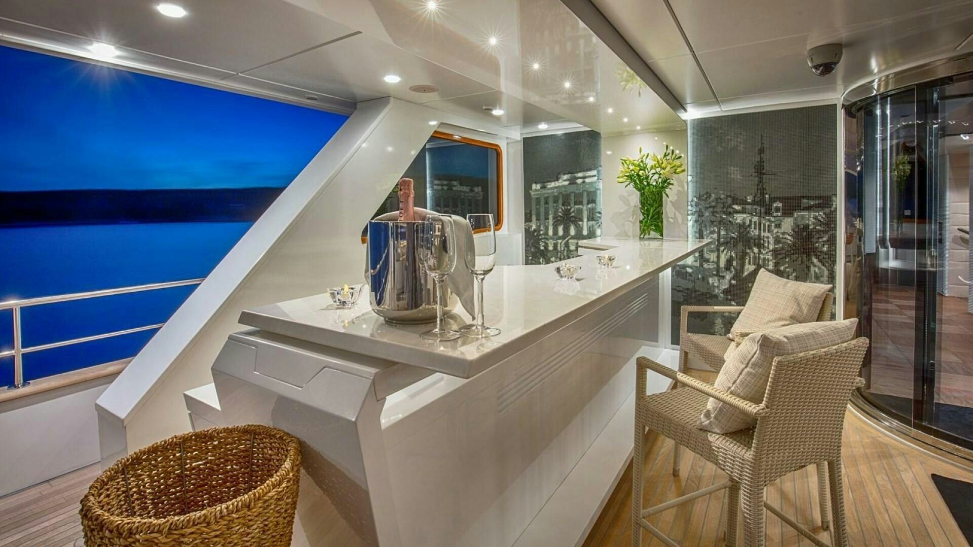 a room with a large glass wall aboard KATINA Yacht for Sale