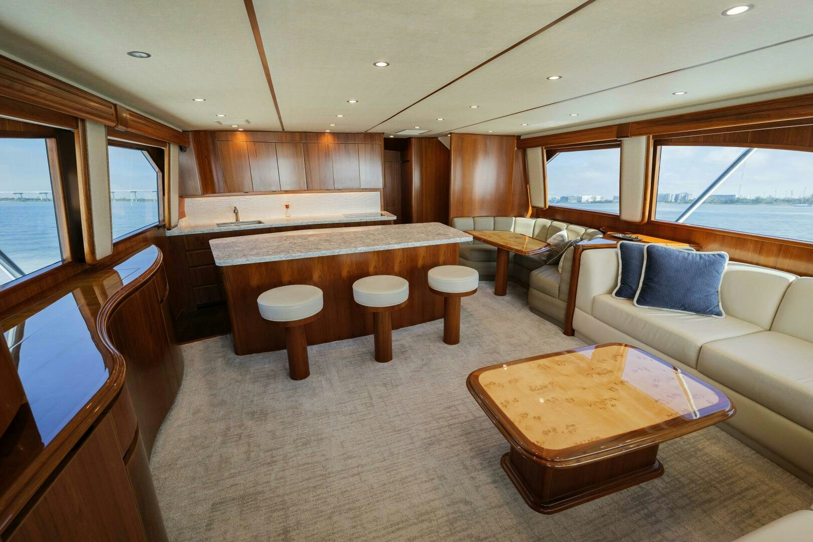 a large living room with a large window aboard BAILEY'S ARK Yacht for Sale