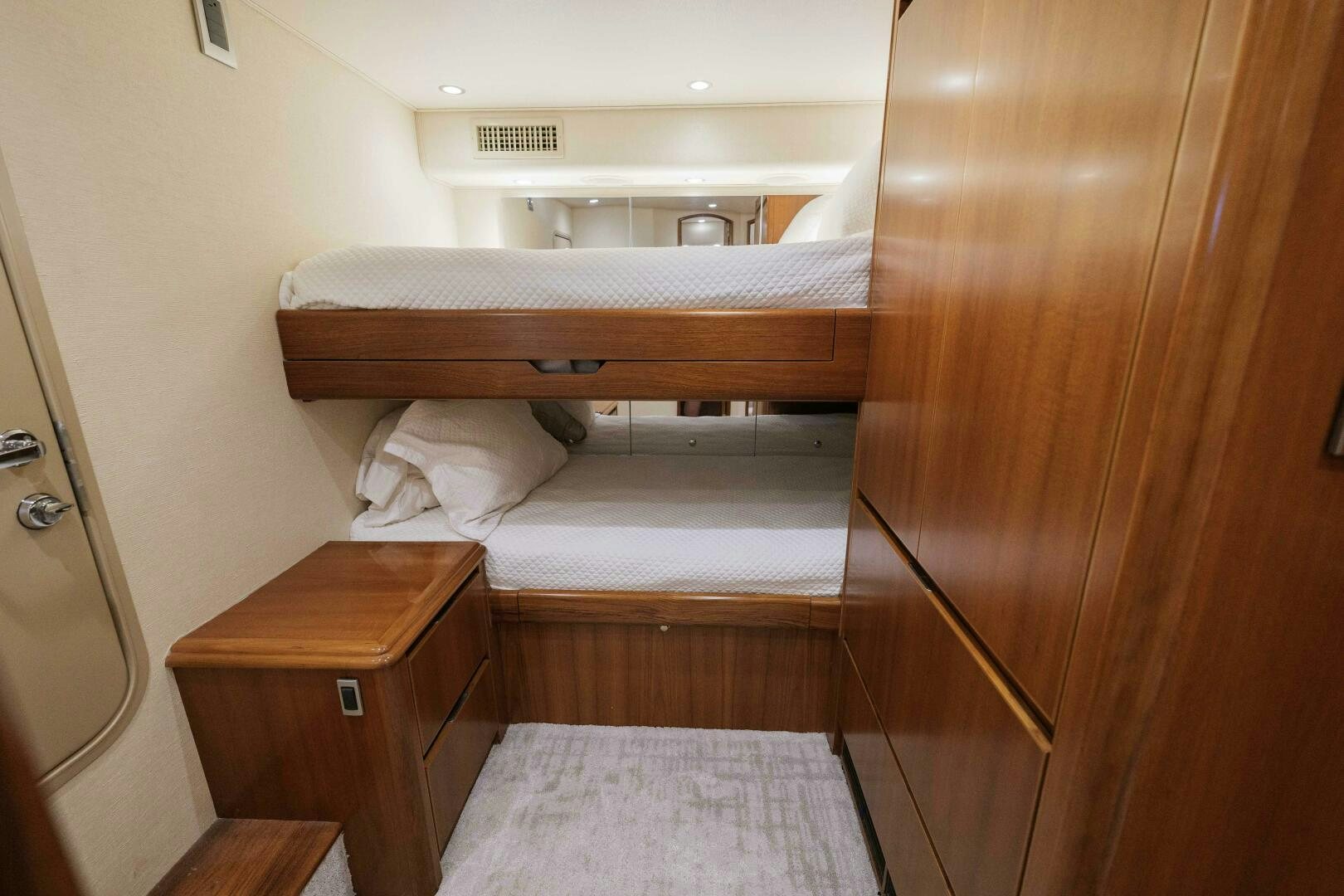 a room with a couple of beds aboard BAILEY'S ARK Yacht for Sale
