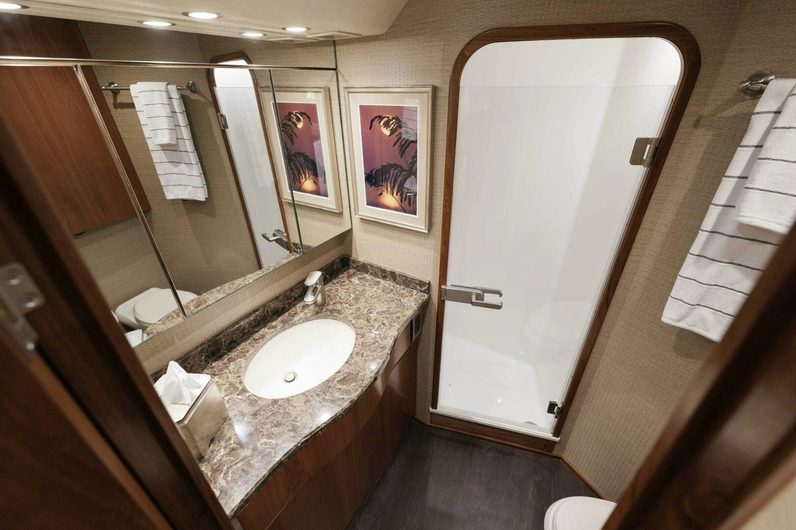 a bathroom with a marble countertop aboard BAILEY'S ARK Yacht for Sale