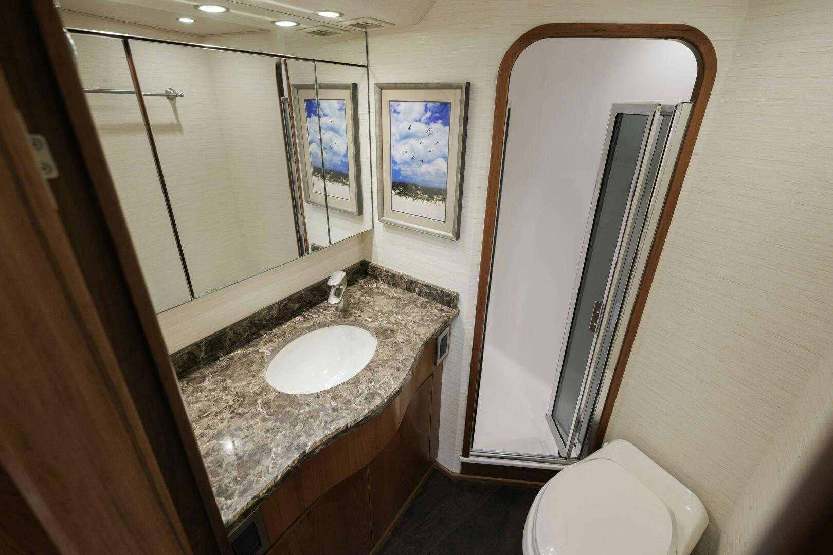 a bathroom with a marble counter top aboard BAILEY'S ARK Yacht for Sale