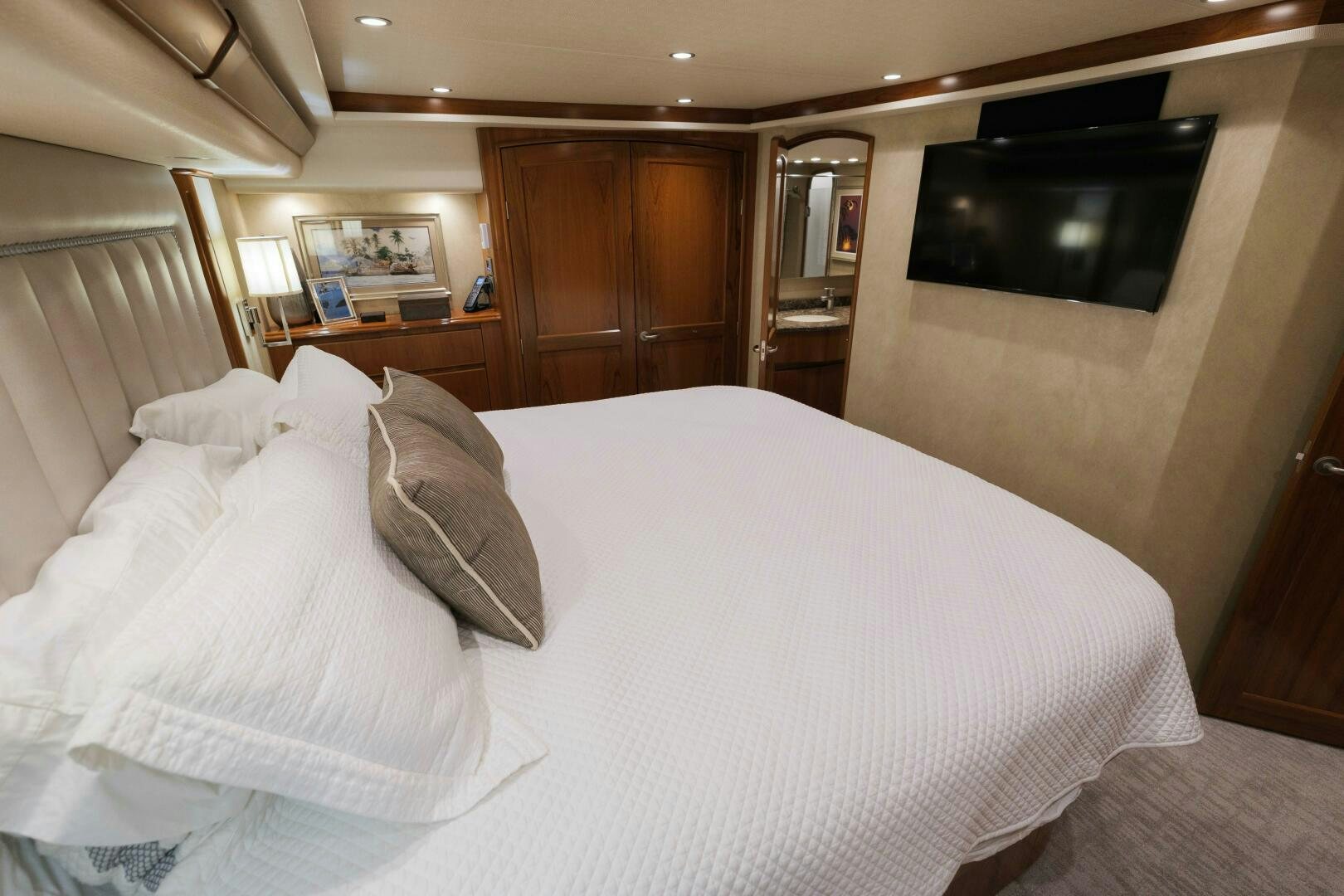 a bed in a room aboard BAILEY'S ARK Yacht for Sale