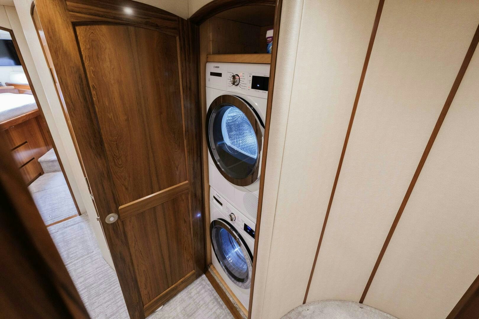 a washer and dryer in a closet aboard BAILEY'S ARK Yacht for Sale