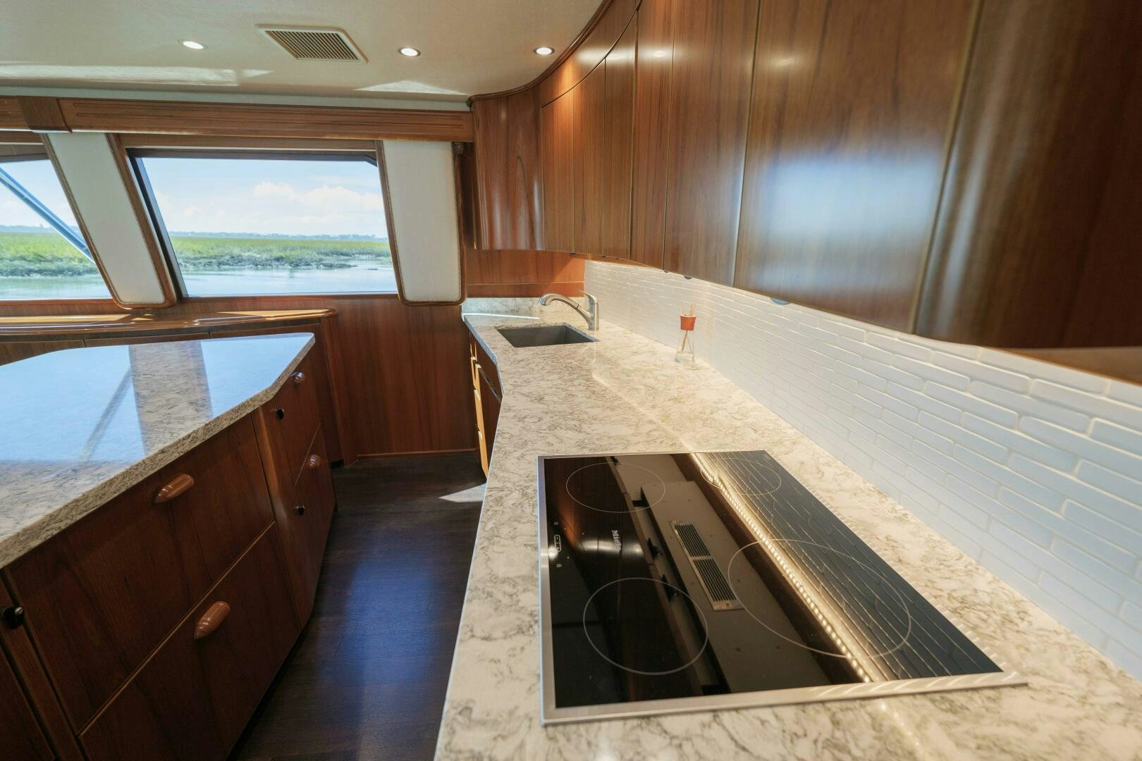 a kitchen with a large island aboard BAILEY'S ARK Yacht for Sale