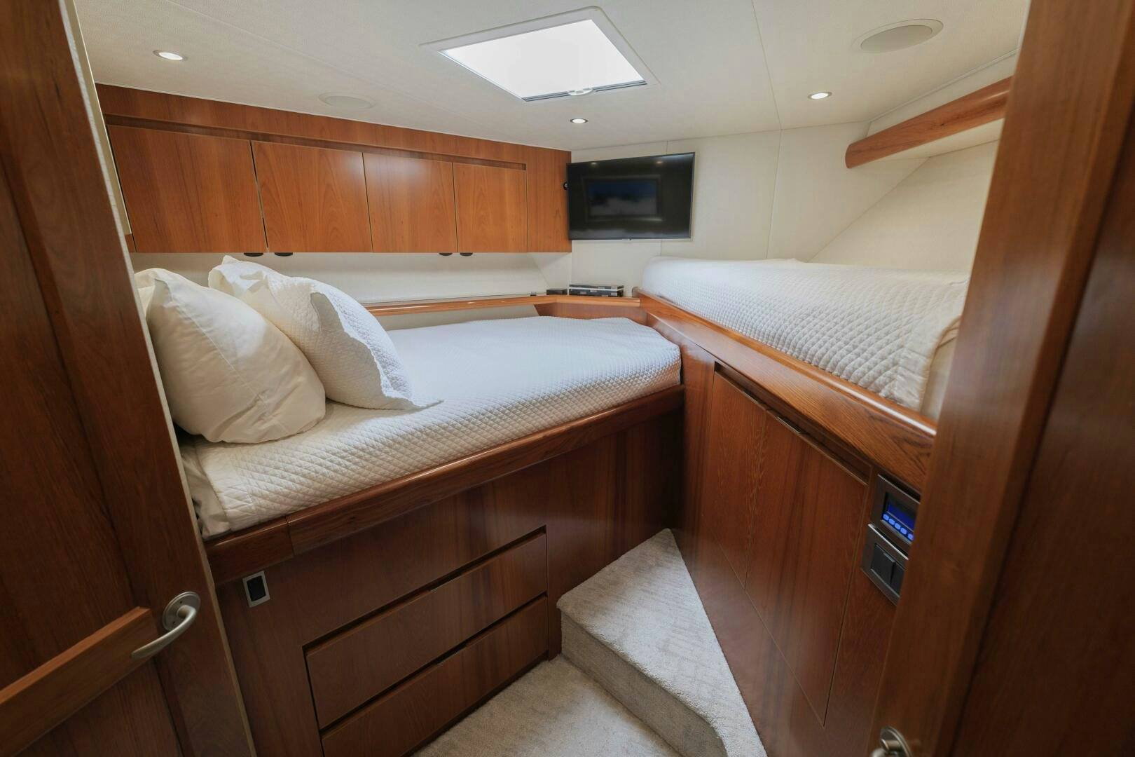 a room with wooden furniture aboard BAILEY'S ARK Yacht for Sale