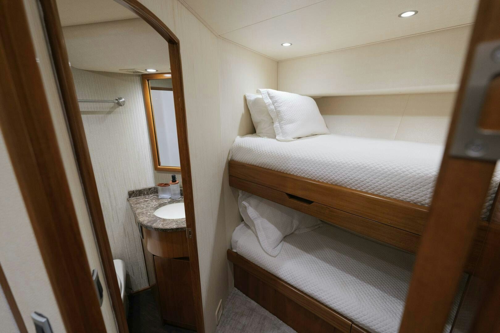 a hotel room with a bed aboard BAILEY'S ARK Yacht for Sale