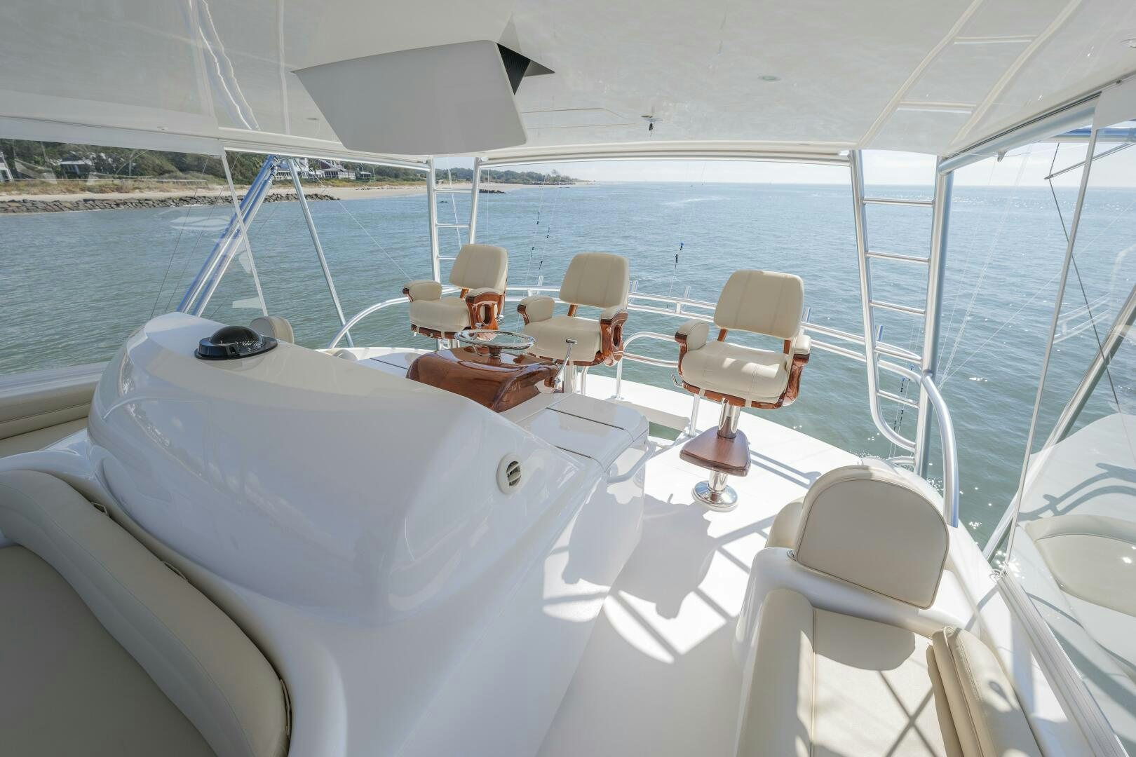 a boat with white chairs on it aboard BAILEY'S ARK Yacht for Sale