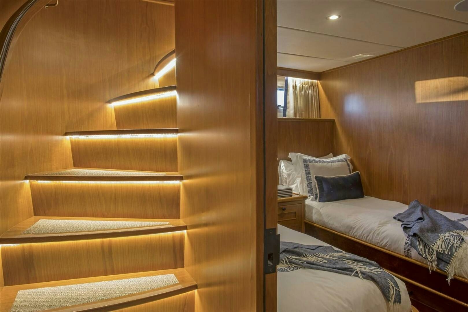 a bed in a room aboard INSIGNIA Yacht for Sale