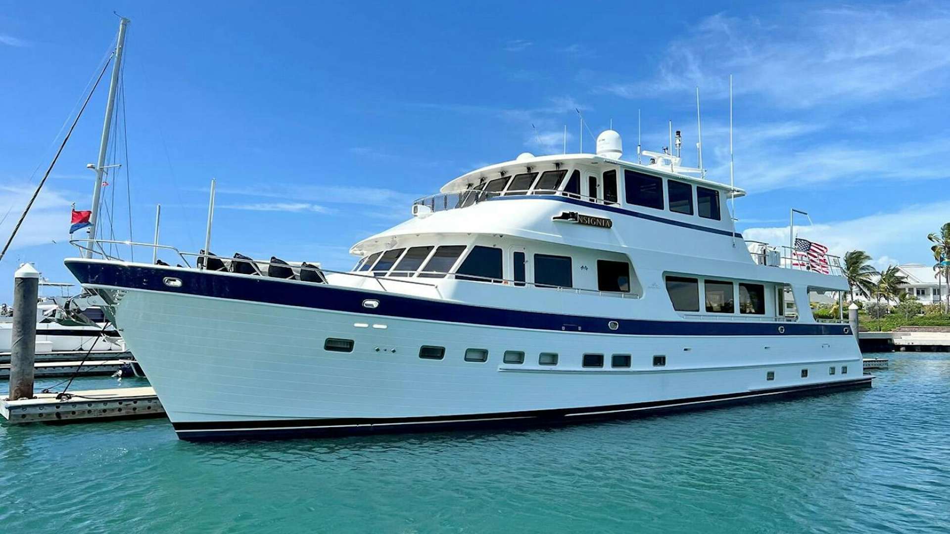 a large white boat aboard INSIGNIA Yacht for Sale