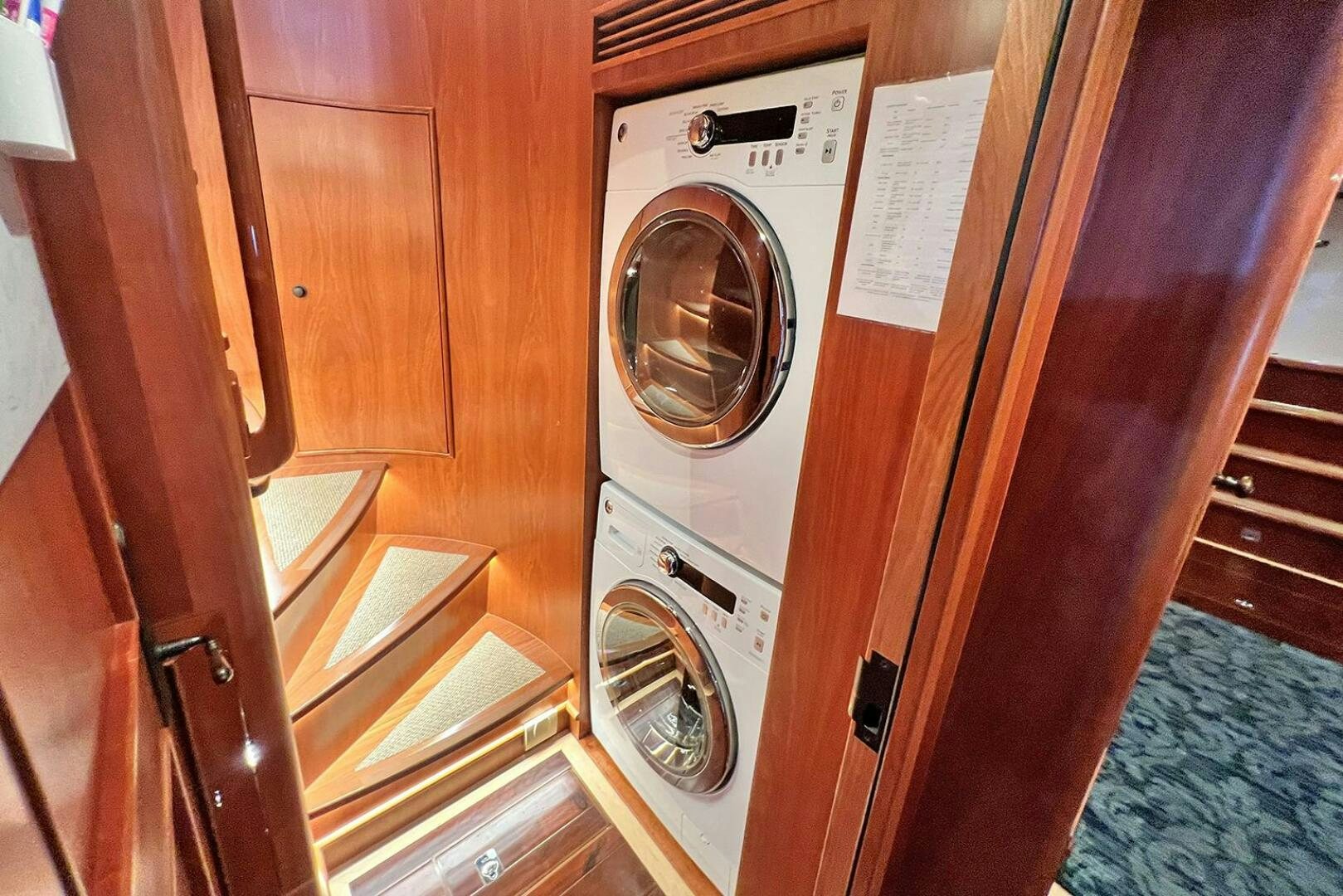 a white washing machine aboard INSIGNIA Yacht for Sale