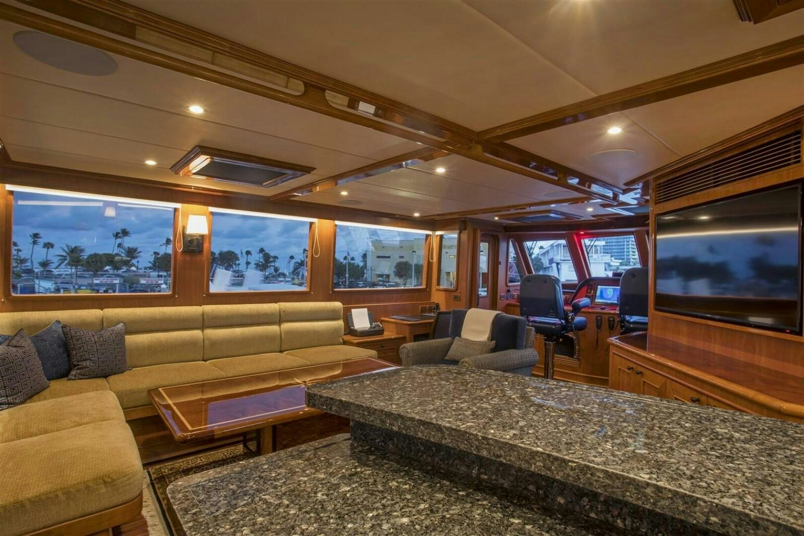 a living room with a large bed aboard INSIGNIA Yacht for Sale