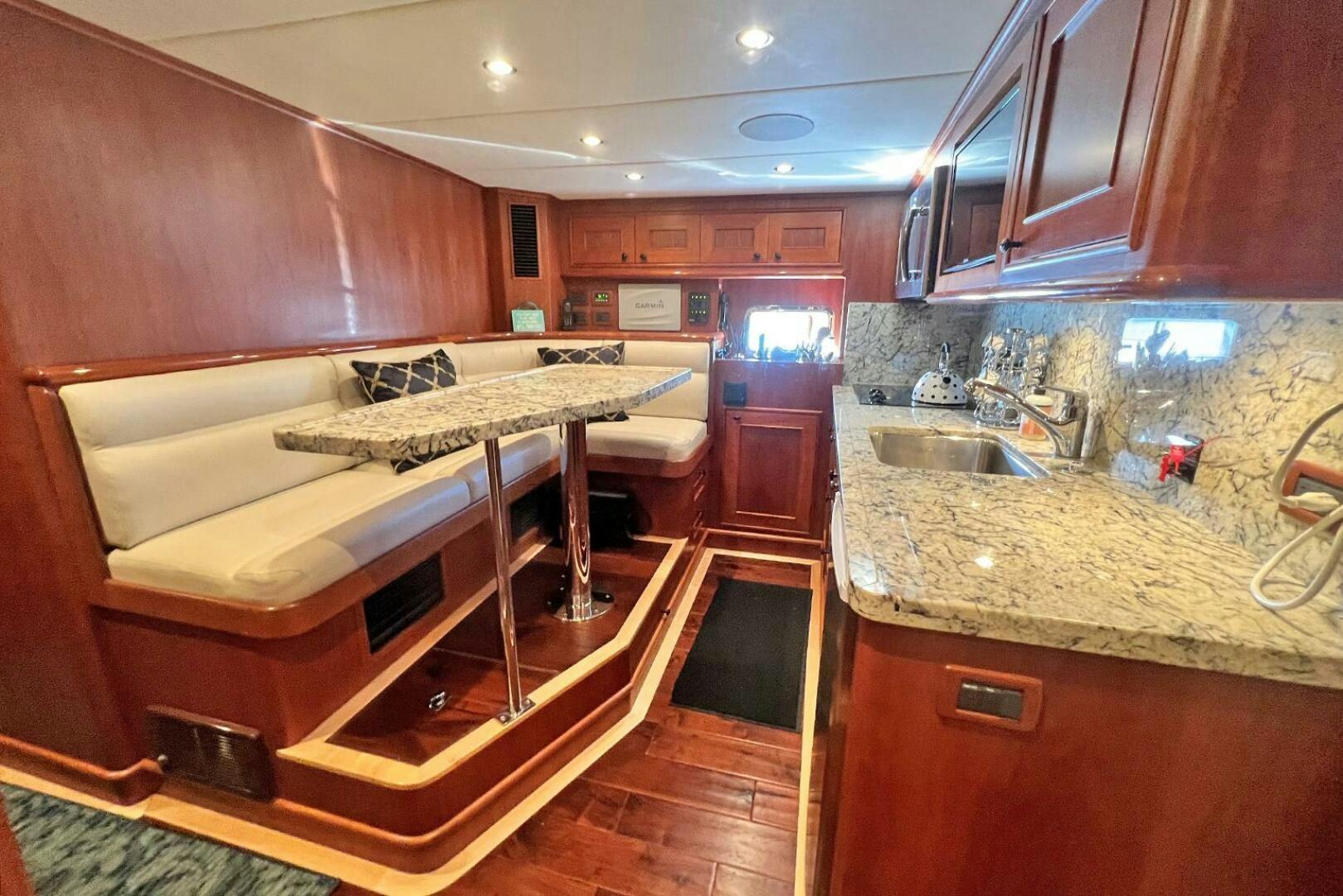 a kitchen with a piano aboard INSIGNIA Yacht for Sale
