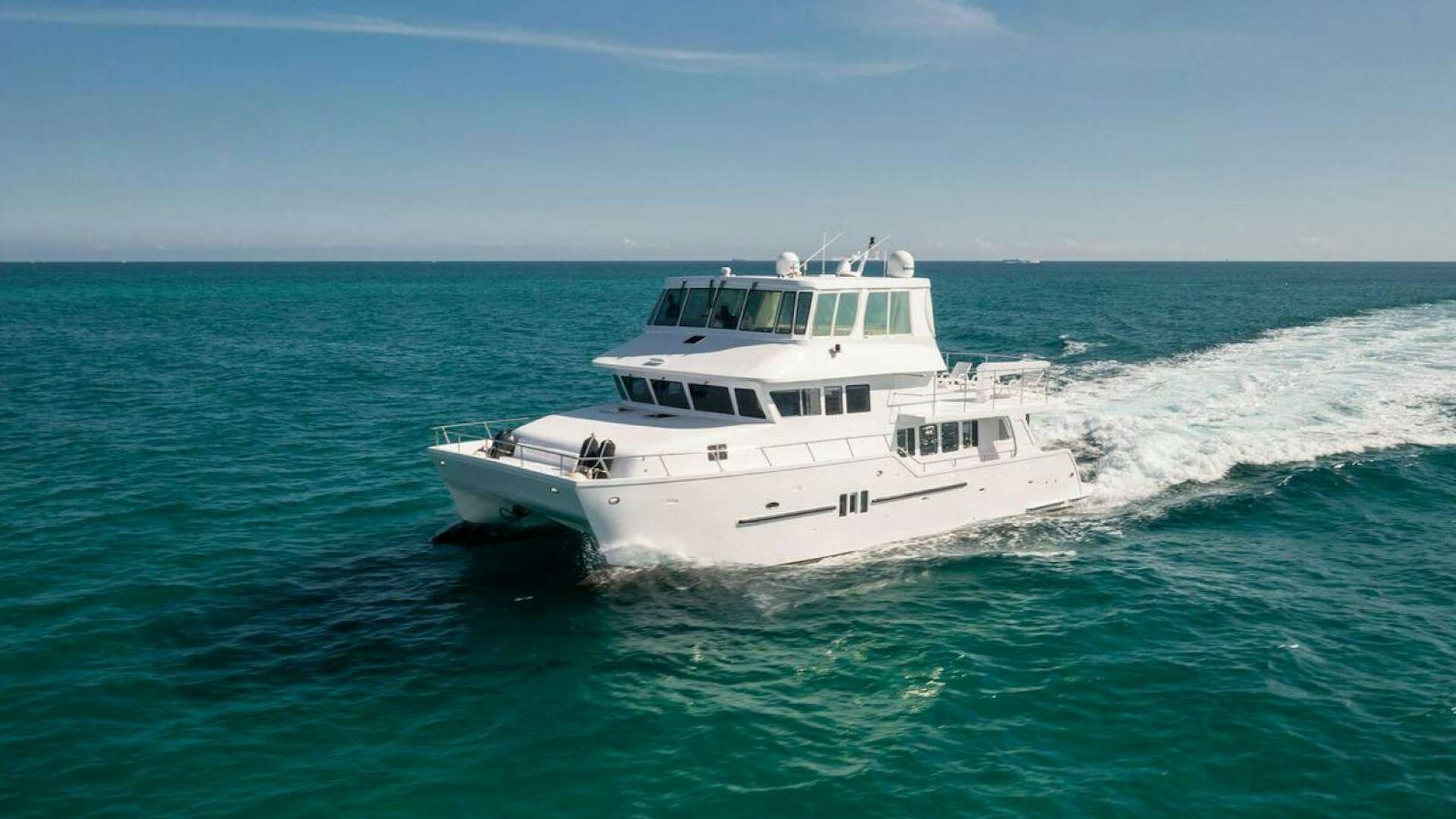 a white boat in the water aboard BARBARA GAIL Yacht for Sale
