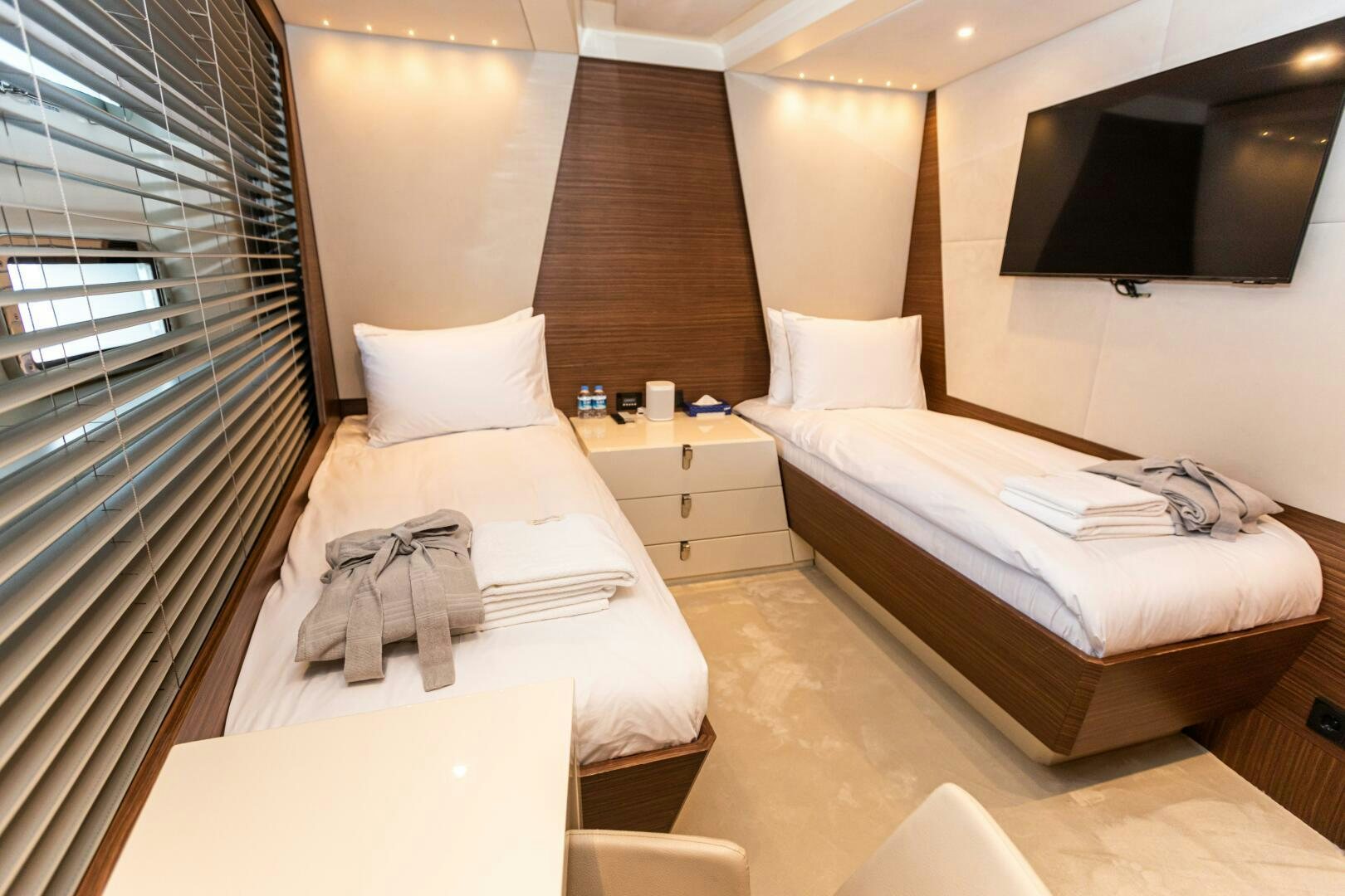 a couple of beds in a hotel room aboard ZEEMAR Yacht for Sale