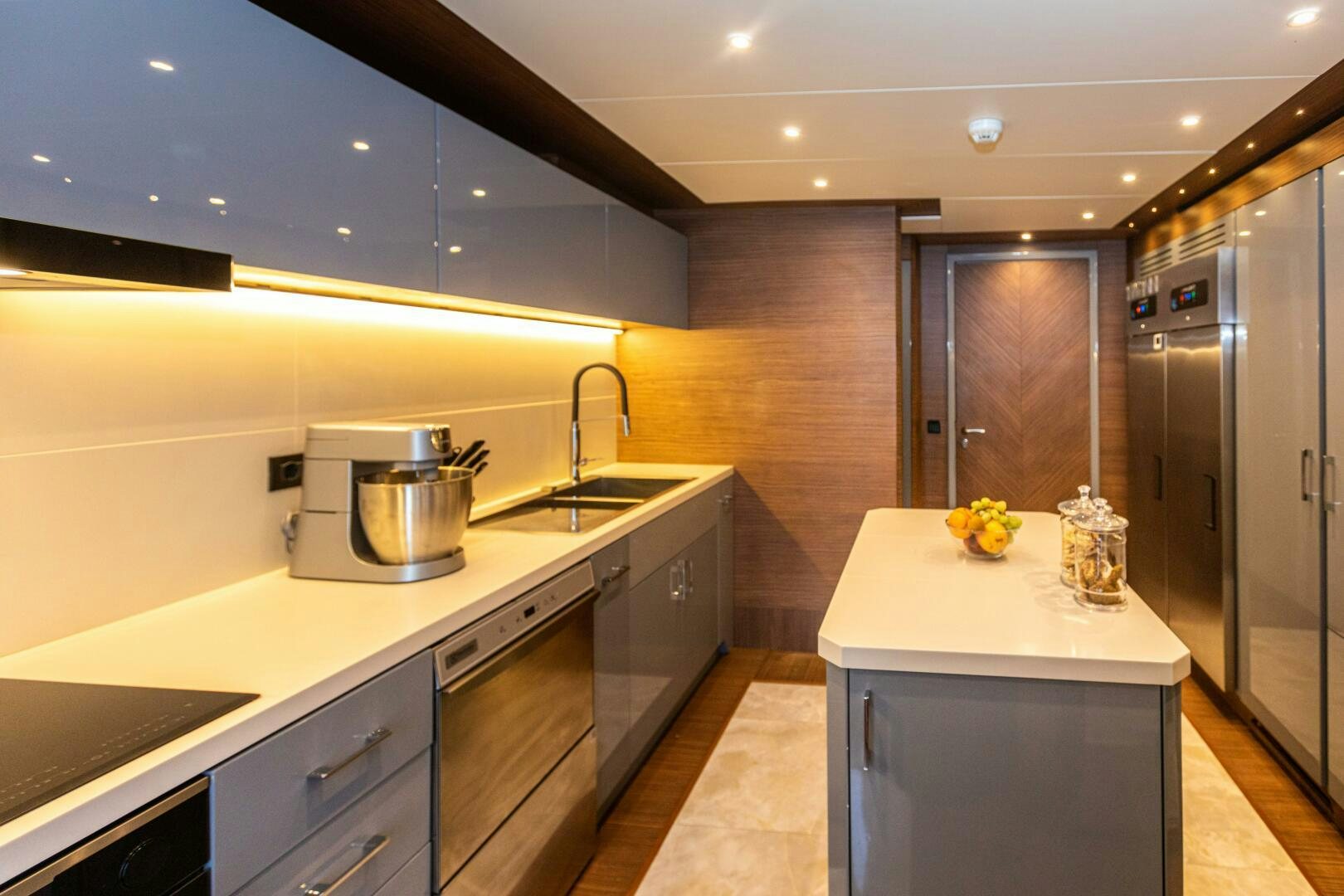 a kitchen with a large island aboard ZEEMAR Yacht for Sale