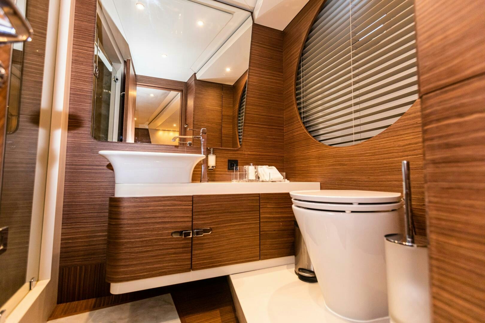 a bathroom with a toilet and a sink aboard ZEEMAR Yacht for Sale
