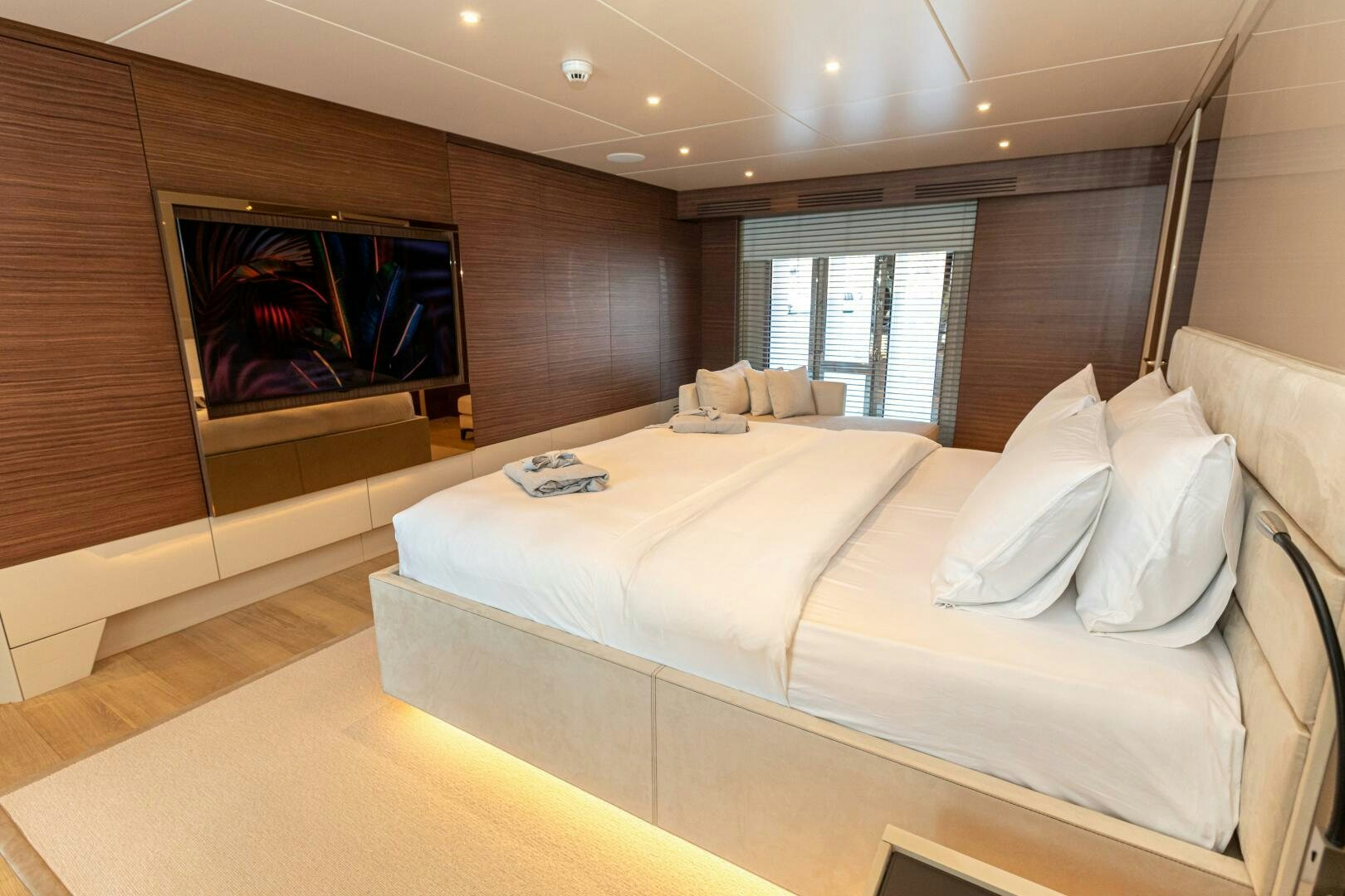 a large bed in a room aboard ZEEMAR Yacht for Sale