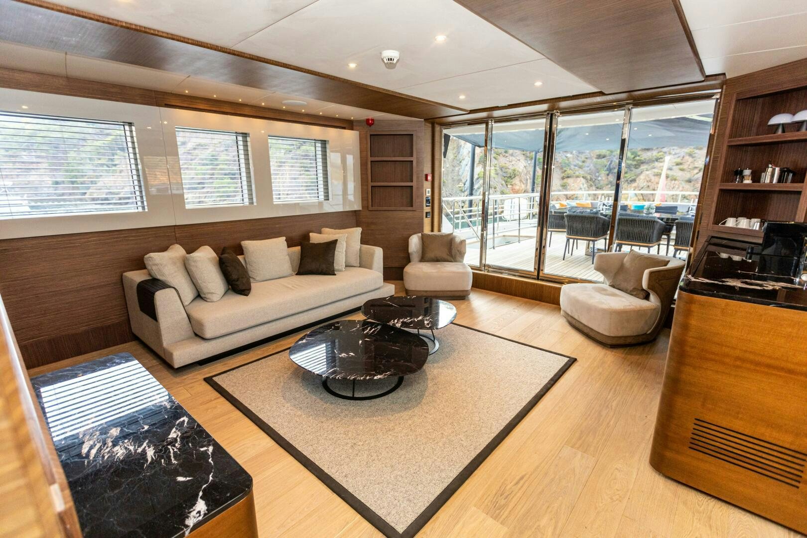 a living room with a large window aboard ZEEMAR Yacht for Sale