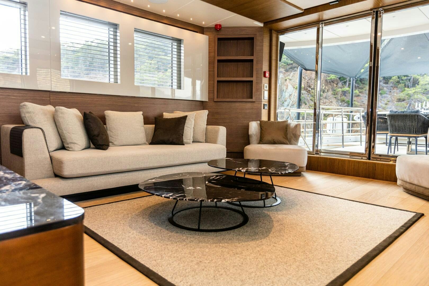 a living room with a large window aboard ZEEMAR Yacht for Sale