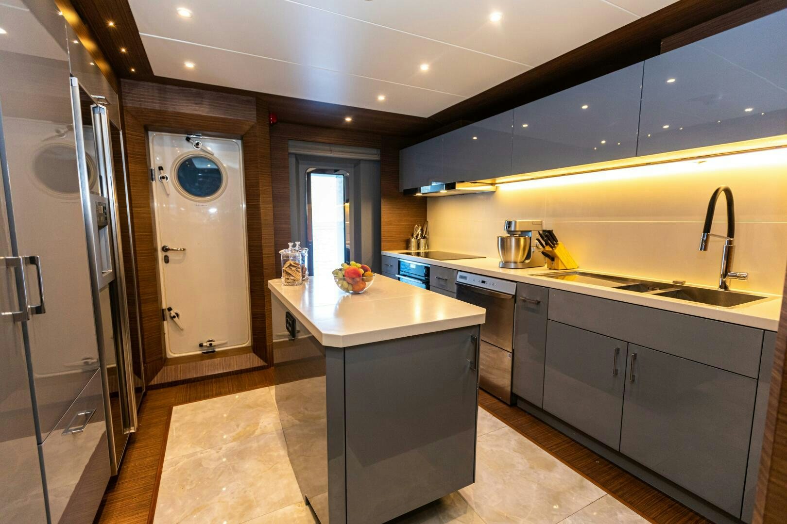 a kitchen with a large island aboard ZEEMAR Yacht for Sale