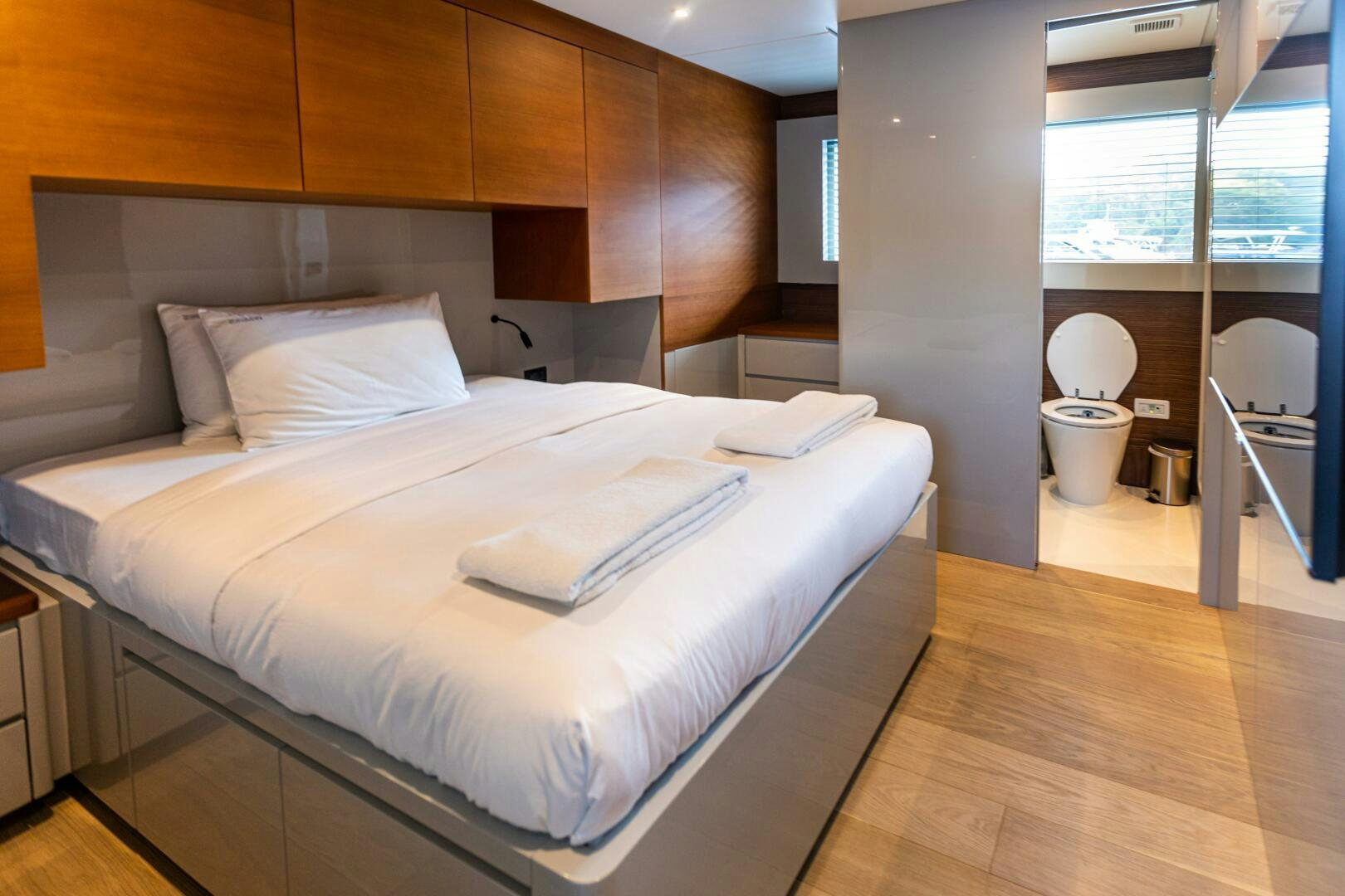 a bed in a room aboard ZEEMAR Yacht for Sale