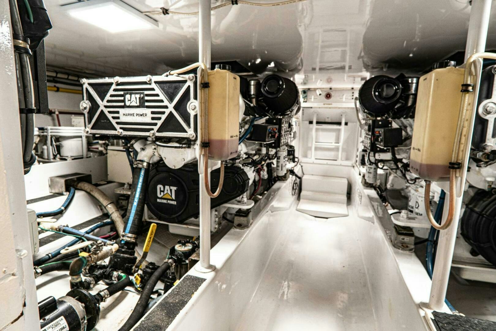 a large machine with large pipes aboard BIG BLUE Yacht for Sale