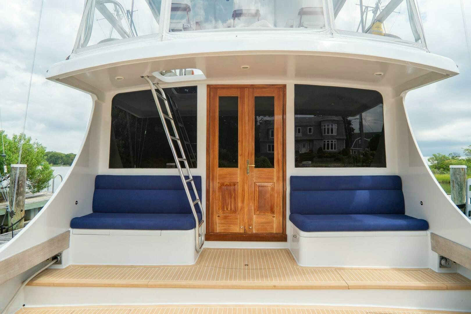 a boat with a door aboard BIG BLUE Yacht for Sale