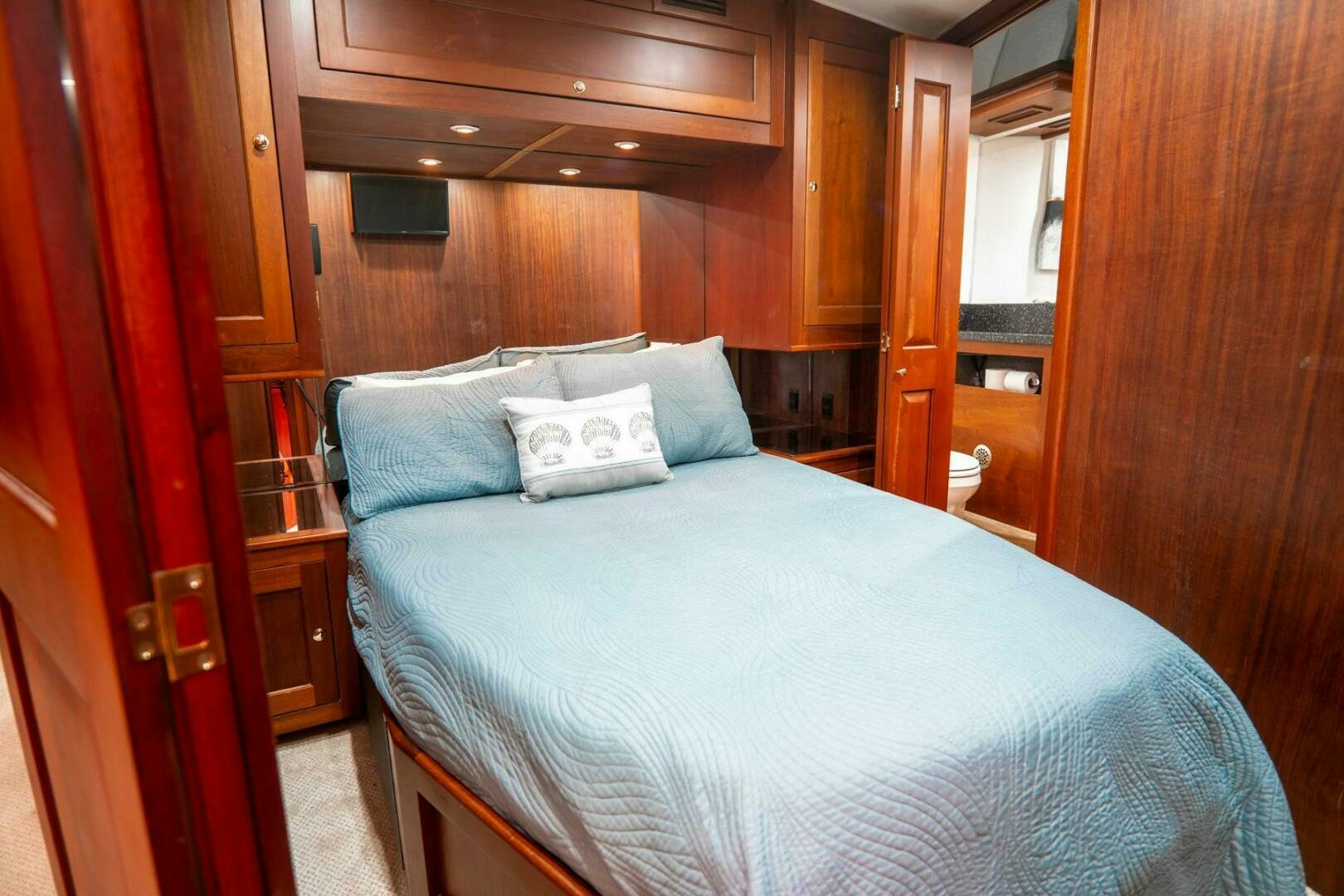 a bed in a cabin aboard BIG BLUE Yacht for Sale