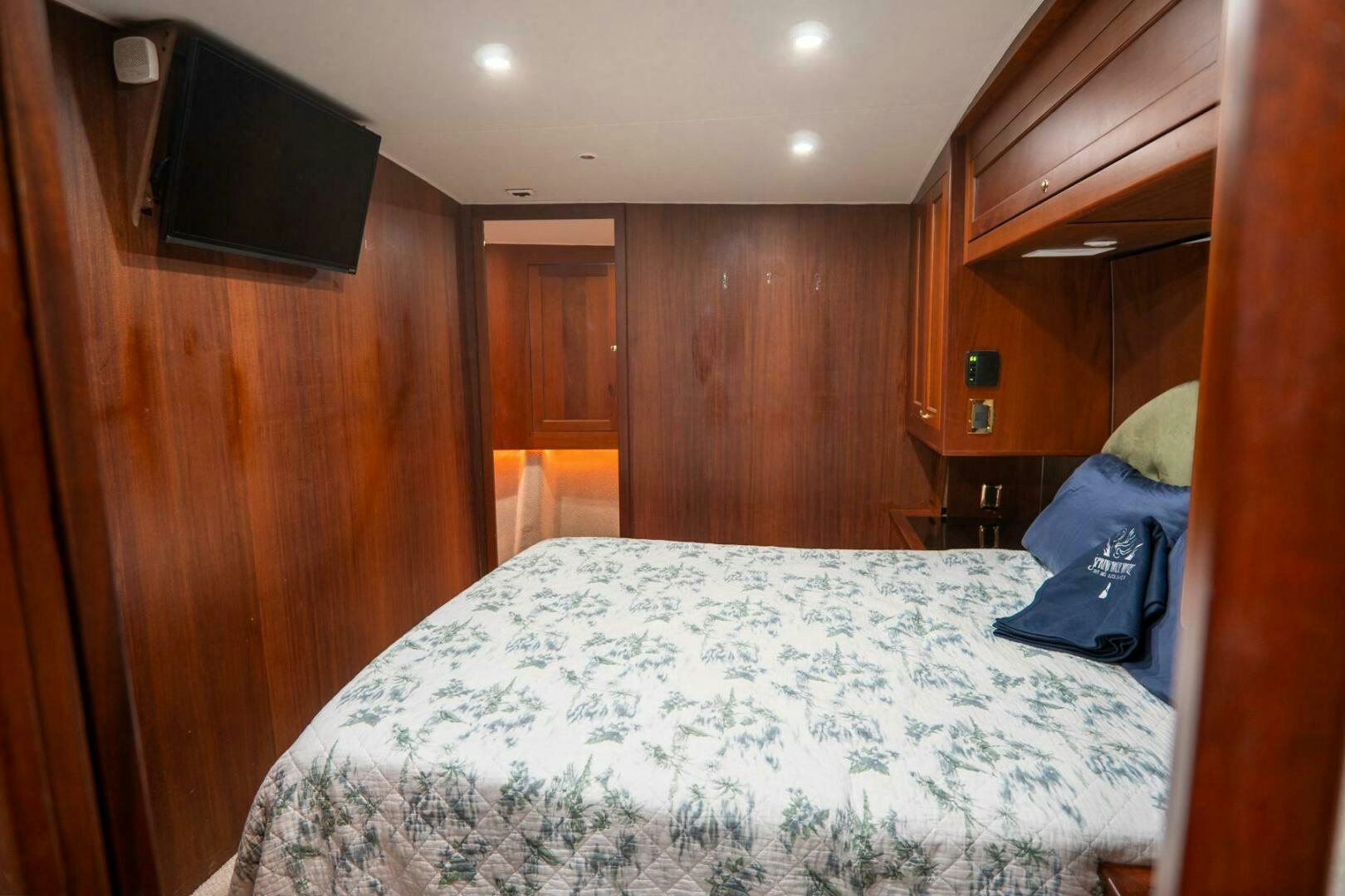 a bed in a room aboard BIG BLUE Yacht for Sale