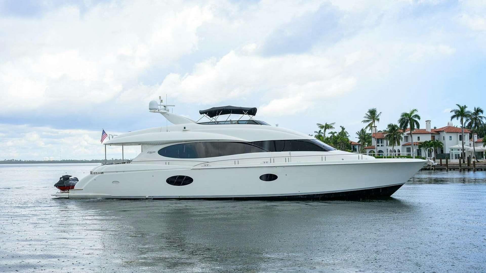 a white yacht in the water aboard LIVING THE DREAM Yacht for Sale
