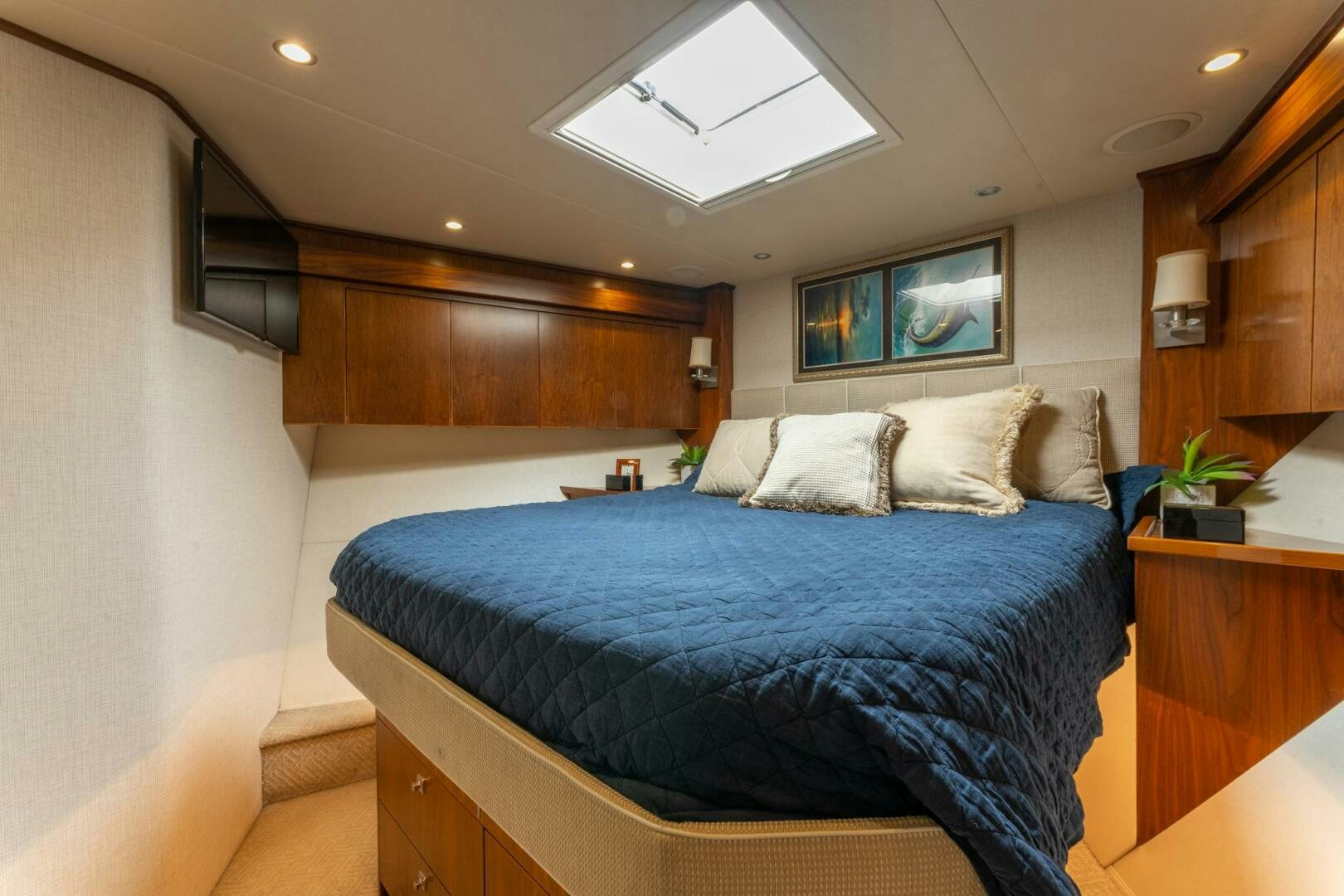 a bed in a room aboard HIGH COTTON Yacht for Sale