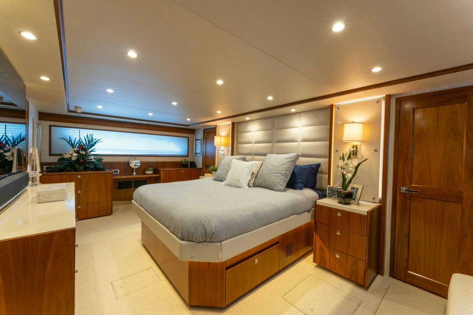 a large bedroom with a large bed aboard HIGH COTTON Yacht for Sale